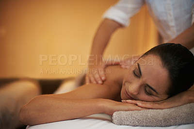 Buy stock photo Shot of an attractive woman enjoying a relaxing massage