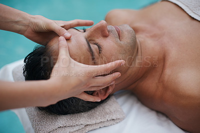 Buy stock photo Spa, man and hands with massage for relax at resort, luxury hotel and vacation for wellness and therapeutic pamper. People, masseuse and body care with head treatment, hospitality and zen by poolside