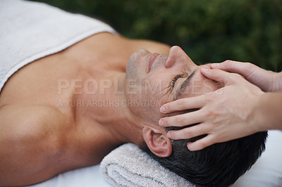 Buy stock photo Spa, man and face with massage for wellness at resort, luxury hotel and vacation for relax and therapeutic pamper. People, masseuse and body care with facial treatment, hospitality and hands outdoor