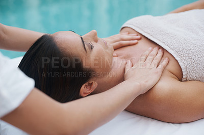 Buy stock photo Hands, woman and masseuse at spa for massage, health and wellness for zen, therapy or peace. Female person, lady or relax for luxury, body or wellbeing on table, natural or calm near pool