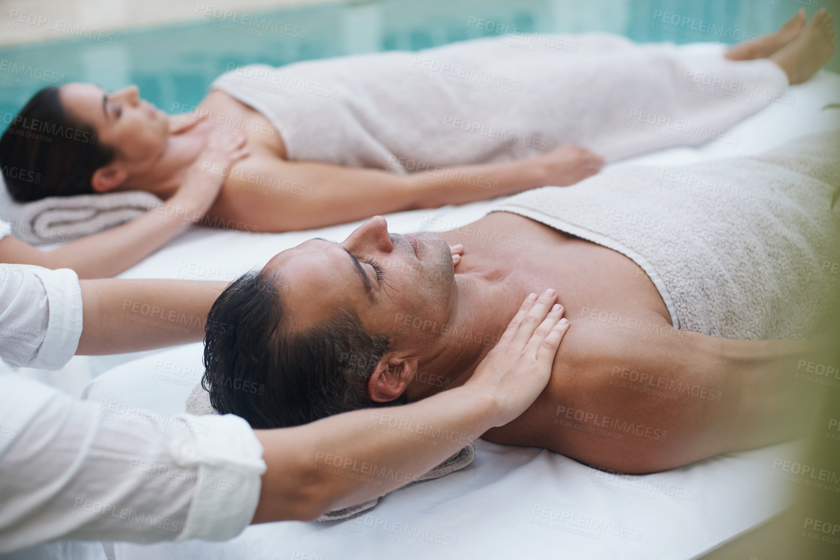 Buy stock photo Spa, man and hands with massage for wellness at resort, luxury hotel and vacation for relax and therapeutic pamper. People, masseuse and body care with shoulder treatment, hospitality and zen outdoor