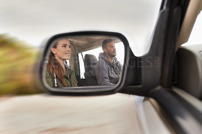 Buy stock photo Couple, car and mirror on roadtrip with travel for adventure, vacation and reflection with happiness in countryside. Woman, man and driving in transport for holiday journey, tourism or honeymoon trip