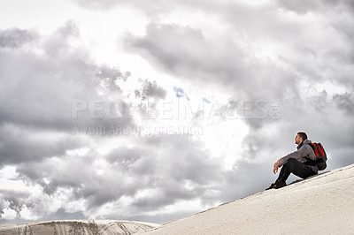 Buy stock photo Travel, backpack or thinking man in desert for adventure, journey or resort, location or exploration. Freedom, holiday or backpacker in Egypt for sand dunes reflection, wellness or hiking in nature