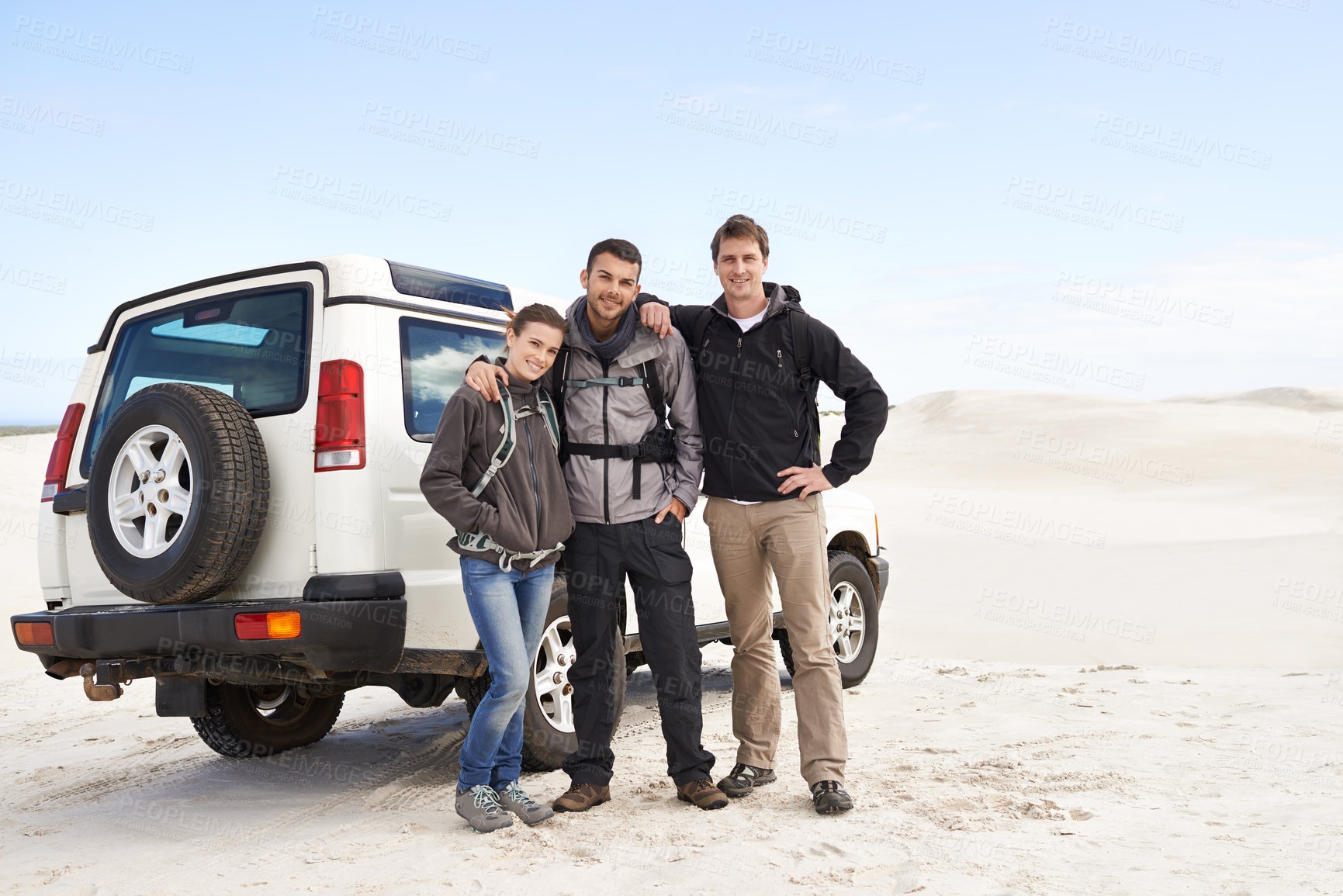 Buy stock photo Friends, portrait and people with car in desert, travel and tourism in Dubai for safari and road trip. Adventure, journey and transportation, offroad vehicle or 4x4 on vacation with break outdoor