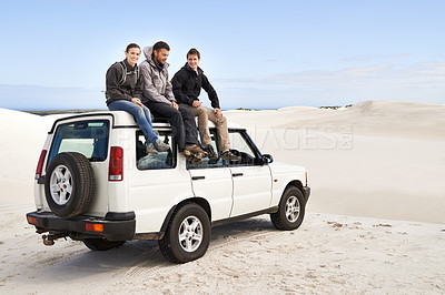 Buy stock photo Car, adventure and friends sitting on roof for road trip break, travel and off road drive in sand dune. Relax, transportation and people in nature for getaway, summer vacation and journey in Mexico