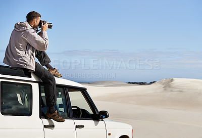 Buy stock photo Road Trip, dunes and man in nature for photography, desert landscape and travel for holiday. Pictures, 4x4 and nomad male person in Sahara terrain, outdoor and transport in dry climate and scenery