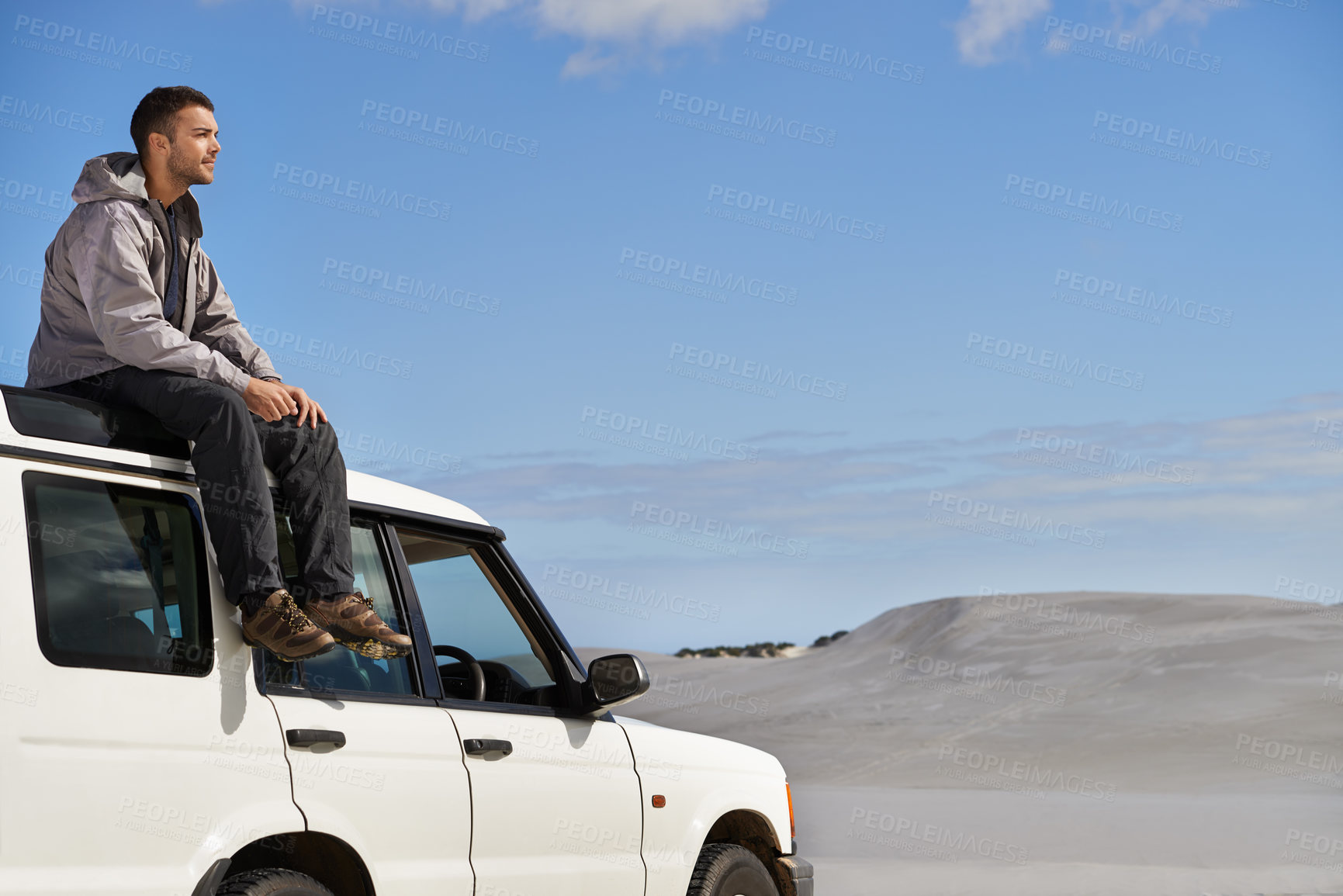 Buy stock photo Hike, dunes and male in nature for adventure, rest and desert landscape for travel or holiday. Thinking, 4x4 and nomad man person in Sahara terrain, outdoor and transport in dry climate and scenery 
