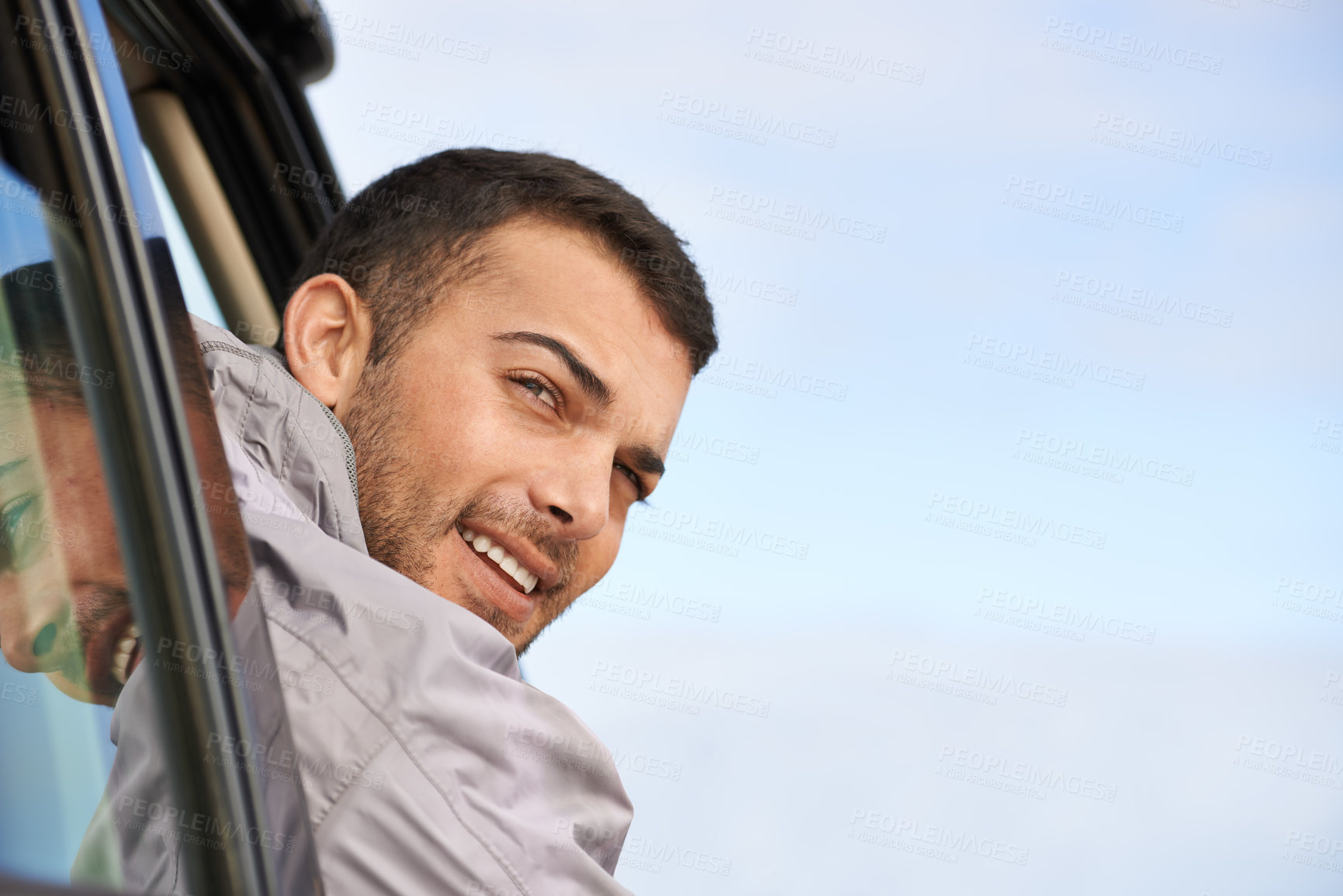 Buy stock photo Road trip, man and window for travel in car, game route and sightseeing for driving adventure in nature. People, traveller or exploration on holiday by blue sky, journey or leisure in vehicle in oman