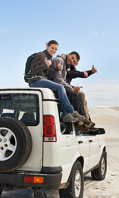 Buy stock photo Road trip, people and thumbs up on jeep, portrait and route for sightseeing and driving adventure in nature. Friends, traveller and happy face on holiday by blue sky, journey and leisure on vehicle