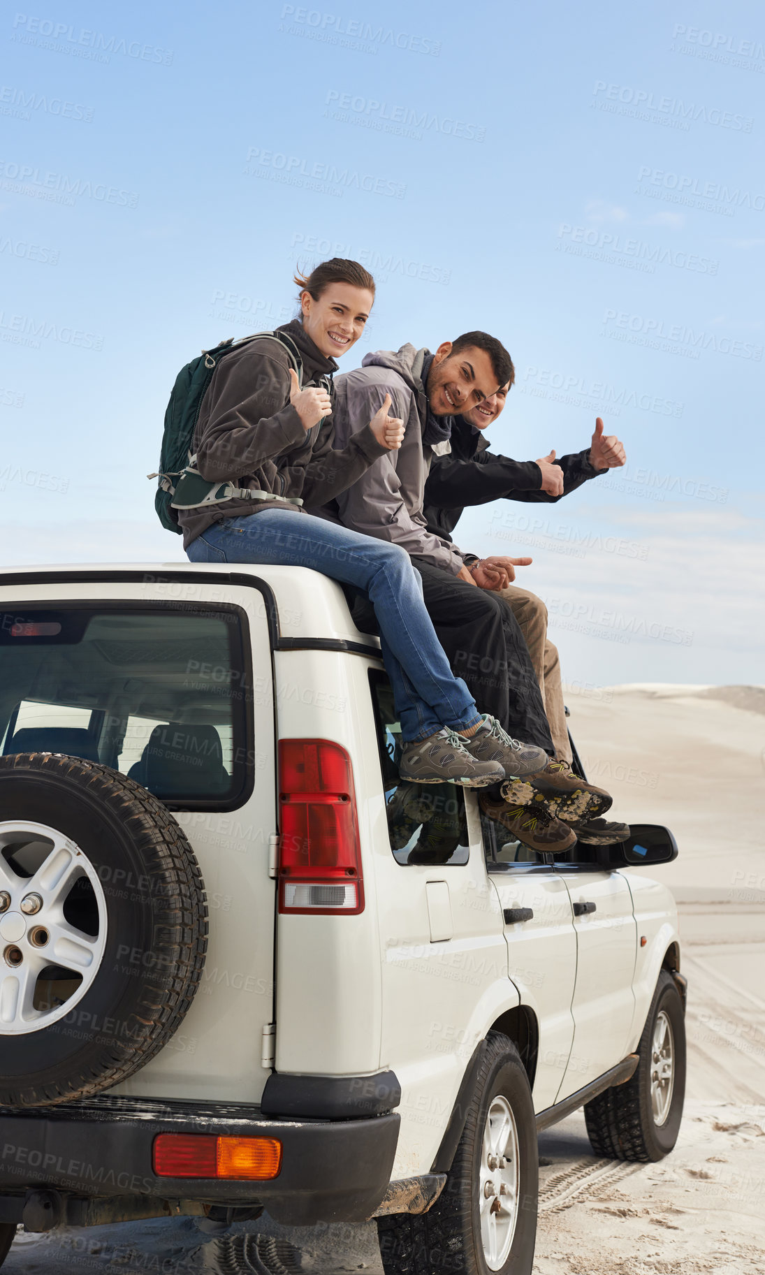 Buy stock photo Road trip, people and thumbs up on jeep, portrait and route for sightseeing and driving adventure in nature. Friends, traveller and happy face on holiday by blue sky, journey and leisure on vehicle