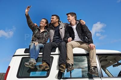 Buy stock photo Friends, car and selfie in smile with smartphone for adventure, holiday and road trip to travel in Australia. People, happy and excited for vacation or break with bonding for memory and together.