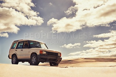 Buy stock photo Jeep, sand or driver in nature for travel, adventure or driving in rugged terrain or dry environment. Car, transportation or man in off road exploration on trail, journey or outdoor dunes in desert