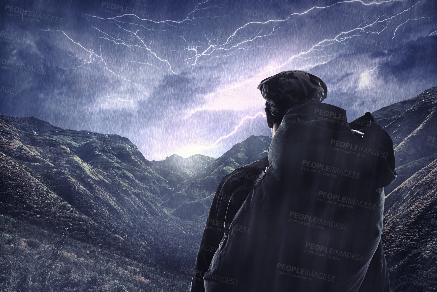 Buy stock photo Lightning storm, travel and a man hiking from the back in the mountains during the night with winter rain. Dark sky, gray clouds and stormy weather with a male hiker outdoor in dangerous conditions