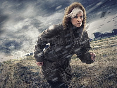 Buy stock photo Woman, forest and running in storm weather, nature and survival or safety for climate change. Athlete, warm jacket or strong in woods with rain, environment or runner for global warming as warning