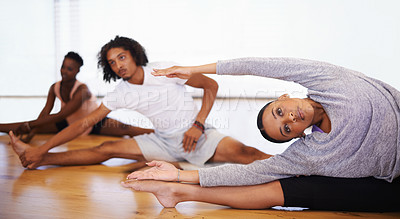 Buy stock photo Dance, class and people stretching legs on floor to start rehearsal together in studio or academy. Training, body and healthy exercise for fitness in creative school with yoga or pilates workout