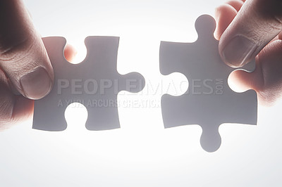 Buy stock photo Puzzle, teamwork and synergy with hands of person on white background for achievement, solution or development. Mission, game and cooperation with of jigsaw piece for support, success and integration