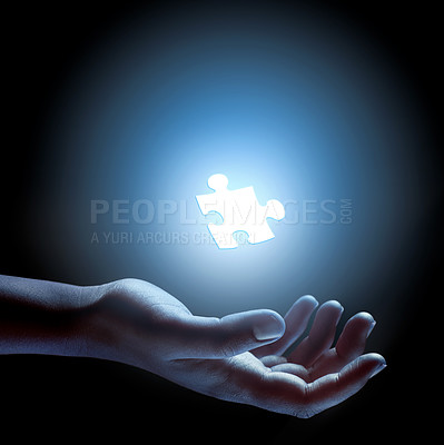 Buy stock photo Puzzle, piece and abstract solution in hand for problem solving, challenge and planning with strategy. Jigsaw, games or shape of idea to glow in light of dark and search for innovation in business
