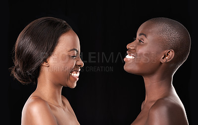 Buy stock photo Studio, skin care and happy friends, cosmetics and satisfaction on black background. African women, friends and together for dermatology or facial treatment, laughing and proud of wellness glow