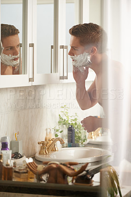 Buy stock photo Man, cream for shaving and grooming in bathroom, skincare and beauty with morning routine at sink. Skin health, cosmetic foam or soap for hygiene, dermatology and hair removal with facial at home