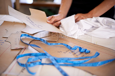 Buy stock photo Cropped shot of a female seamstress at work