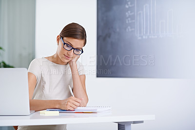 Buy stock photo Woman, teacher and writing notes by laptop, education and inspiration for school curriculum. Female person, ideas and internet for research in classroom, problem solving and journal for lesson plan