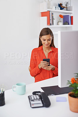 Buy stock photo Woman, smartphone and chat at desk for communication, social media and browsing on break at startup. Reading email, contact and using phone for mobile app, connectivity and network at the office