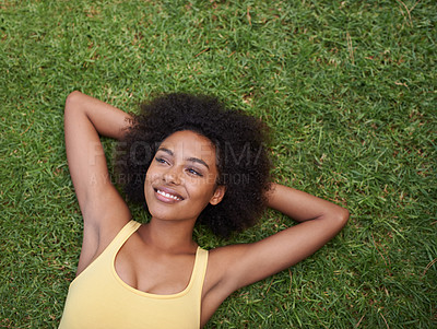 Buy stock photo Happy, grass and above of black woman in park for thinking, wondering and relax in nature. Smile, garden and top view of person laying outdoors for holiday, vacation and weekend for calm or peace