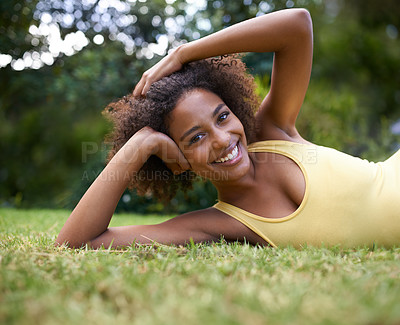 Buy stock photo Happy, grass and portrait of black woman in nature for relaxing, calm and peace in park. Smile, garden and person laying outdoors for holiday, vacation and weekend for wellness, fresh air and joy