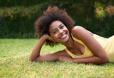 Buy stock photo Happy, grass and portrait of black woman in garden for relaxing, calm and peace in park. Smile, nature and person laying outdoors for holiday, vacation and weekend for wellness, fresh air and joy