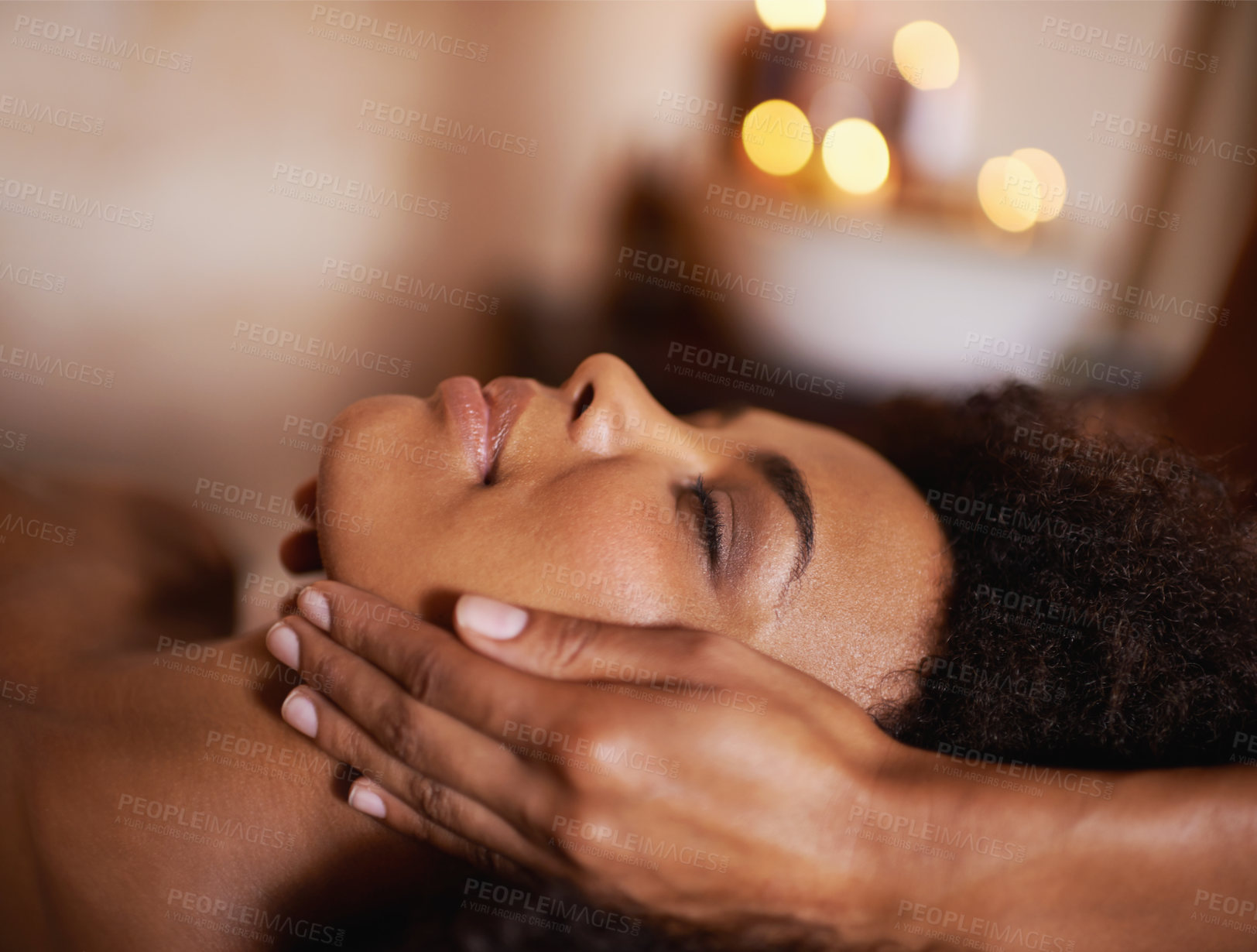 Buy stock photo Black woman, closeup of hands on face and massage with masseuse, beauty and bodycare at spa for stress relief and wellness. Treatment, facial and healing for zen, self care and relax at luxury resort