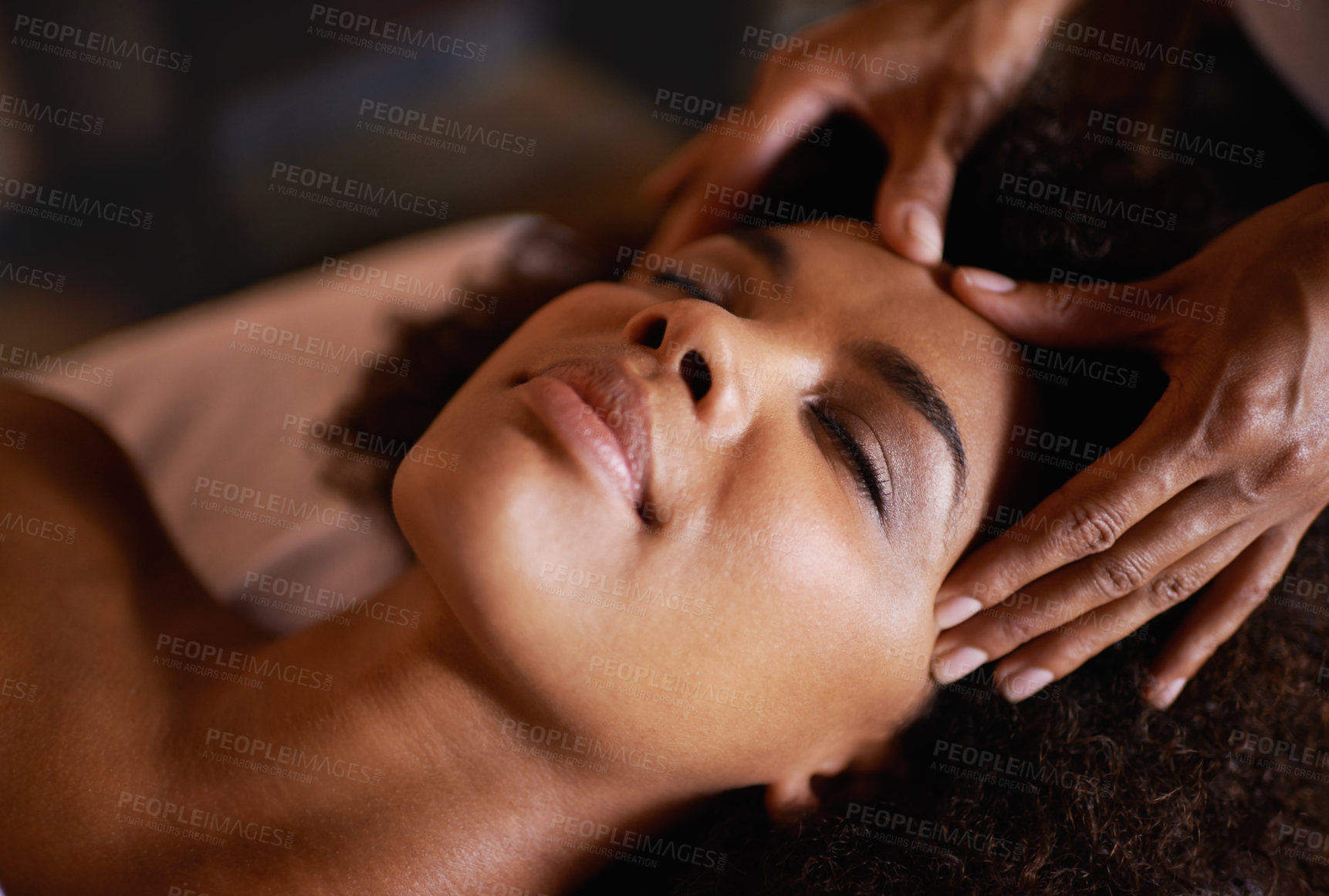Buy stock photo Woman, face and massage with hands and reflexology for facial, spa wellness and beauty treatment on bed. Skin, towel and calm african female person with skincare and relax at hotel with glow 
