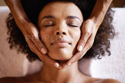 Buy stock photo Woman, spa and massage on face with hands and care for facial, wellness and beauty treatment on bed. Above, towel and calm african female person with skincare and relax at a hotel with skin glow 