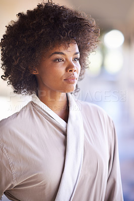 Buy stock photo Skincare, beauty and cosmetic treatment for woman in spa for break or relax on weekend. African person and natural for holistic and wellness care for hygiene and clean in robe for peace and health 