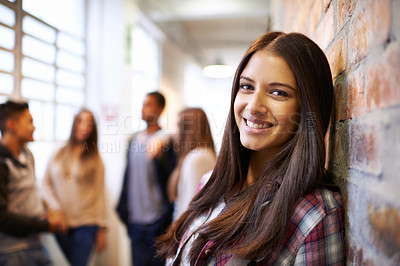 Buy stock photo Education, happy and portrait of woman in college hallway for studying, learning and scholarship. Future, happy and knowledge with student leaning against wall for university, relax and campus