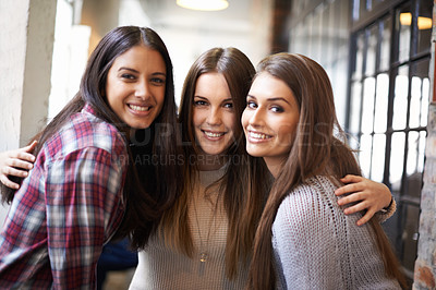 Buy stock photo University, friends and portrait of women hug on campus for studying, education and learning together. Friendship, scholarship and happy female students smile in school, academy and college hallway