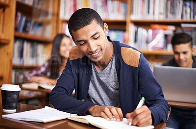 Buy stock photo Study, writing and smile with man in library for education, research and classroom quiz. Focus, learning and notebook with male student on university campus for knowledge, scholarship and project