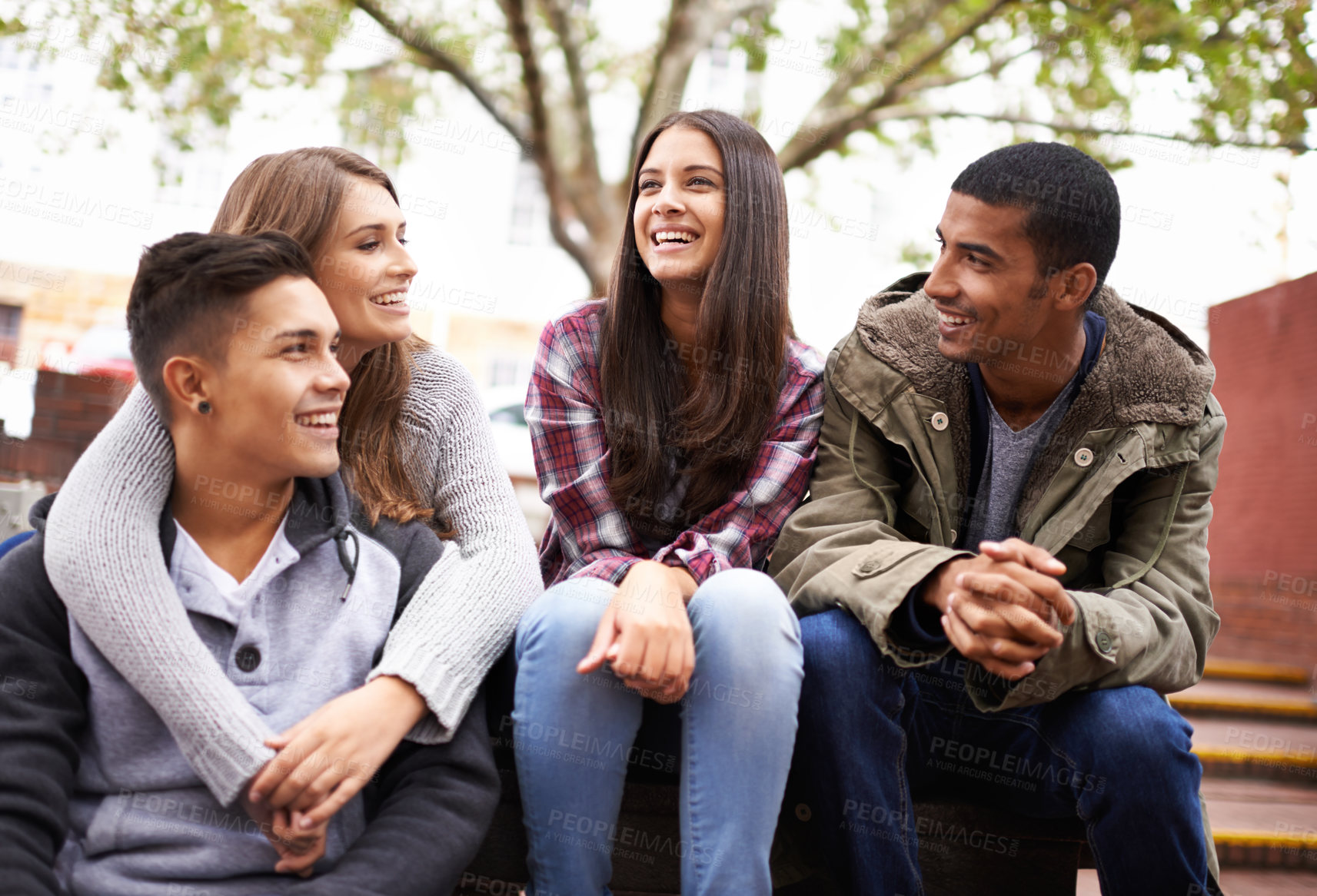 Buy stock photo University, happy and friends on campus stairs in conversation, talking and chatting outdoors. Diversity, education and happy men and women students for social bonding on school, academy and college
