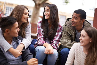 Buy stock photo University, community and people chat on campus in conversation, talking and laughing outdoors. Diversity, education and happy men and women students smile for learning at school, academy and college
