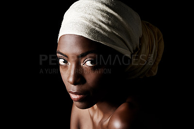 Buy stock photo Beauty, portrait and serious black woman in headscarf, natural makeup or creative aesthetic in studio. Art, skincare and African girl on dark background with head wrap, facial cosmetics or confidence