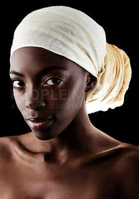 Buy stock photo Beauty, portrait and black woman in studio with headscarf, natural makeup or creative aesthetic. Art, skincare and African girl on dark background with head wrap, facial cosmetics and confidence.