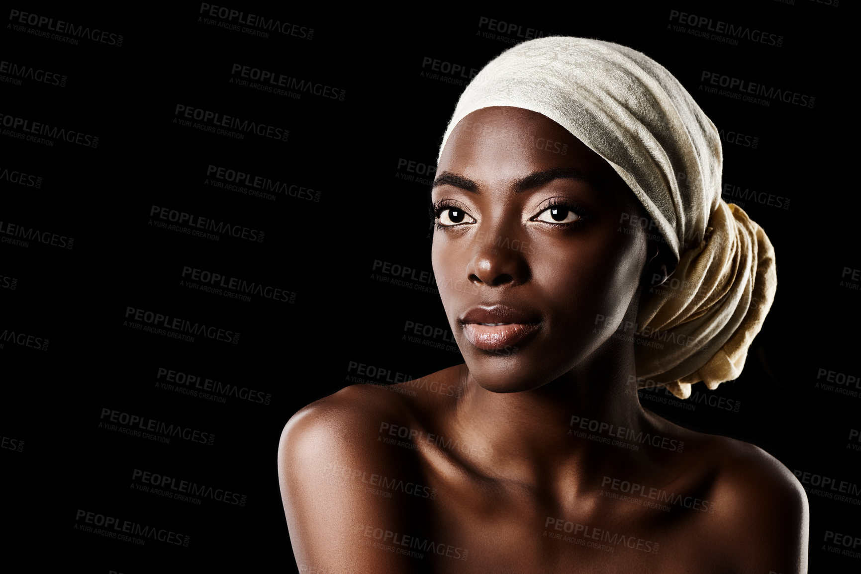 Buy stock photo Beauty, glamour and black woman with head wrap, natural makeup or creative aesthetic in studio mockup. Art, skincare and African queen on dark background with scarf, facial cosmetics and confidence.