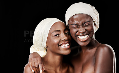 Buy stock photo Happy, head scarf and portrait of black women in studio for wellness, health and hair care treatment. Salon aesthetic, friends and people with accessories, cosmetics and beauty on dark background