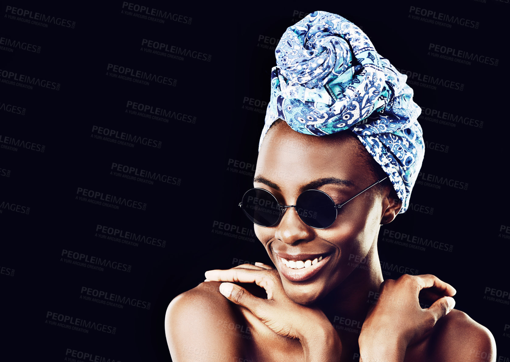 Buy stock photo Face, smile and culture with African woman in studio isolated on black background for heritage. Aesthetic, space and sunglasses with happy young person in trendy headwear for traditional style