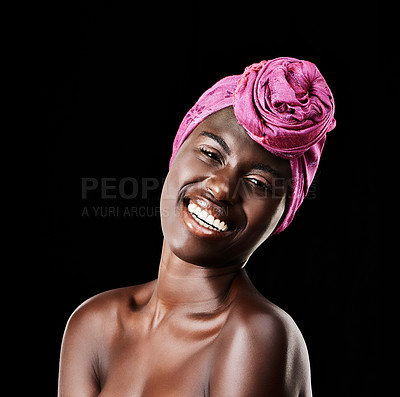 Buy stock photo Black woman, head wrap and beauty portrait with smile, skincare and natural cosmetics in studio. Traditional, turban and African fashion with wellness and skin glow with makeup and dark background