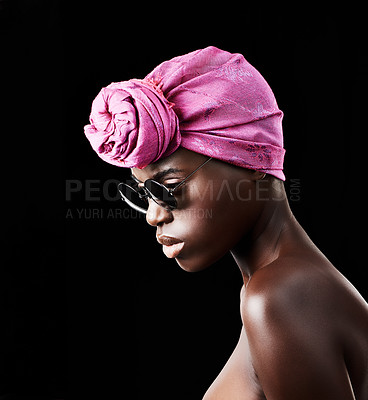 Buy stock photo Profile, fashion and culture with African woman in studio isolated on black background for heritage. Aesthetic, face and sunglasses with confident young model in trendy headwear for traditional style