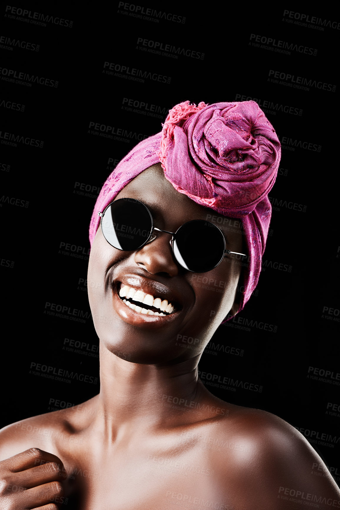 Buy stock photo Portrait, fashion and smile with African woman in studio isolated on black background for heritage. Culture, model and sunglasses with happy young person in trendy headwear for traditional style