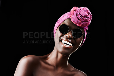 Buy stock photo Portrait, fashion and smile with traditional black woman in studio isolated on dark background for heritage. Aesthetic, model and shades with happy young African person in trendy headwear for style