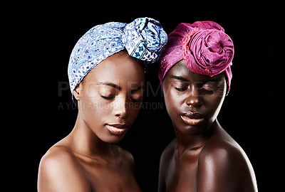 Buy stock photo African, head scarf and women in studio for wellness, health and hair care treatment. Natural beauty, salon aesthetic and people with friends, cosmetics and makeup for culture on black background