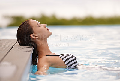 Buy stock photo Summer, peace and woman relax in swimming pool on luxury holiday or vacation at hotel or villa in Cancun. Person, outdoor or enjoy calm water at resort in Mexico or girl in bikini or swimsuit fashion