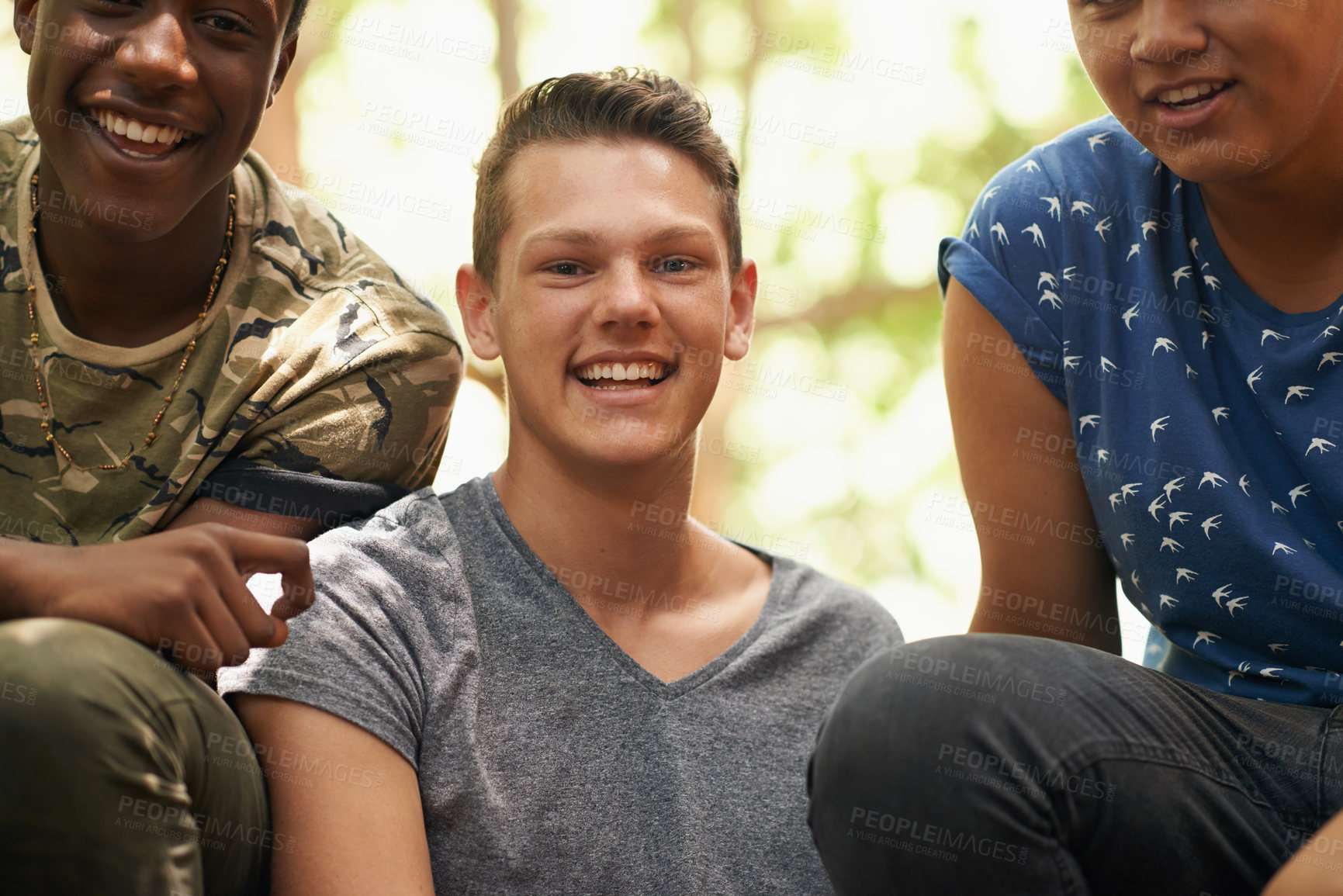 Buy stock photo Smile, nature and portrait of boy with friends on adventure, vacation or holiday together. Happy, travel and face of young teenager with people in outdoor park, garden or field on weekend trip.